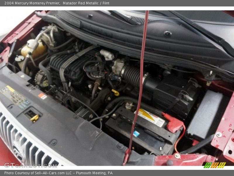 Matador Red Metallic / Flint 2004 Mercury Monterey Premier