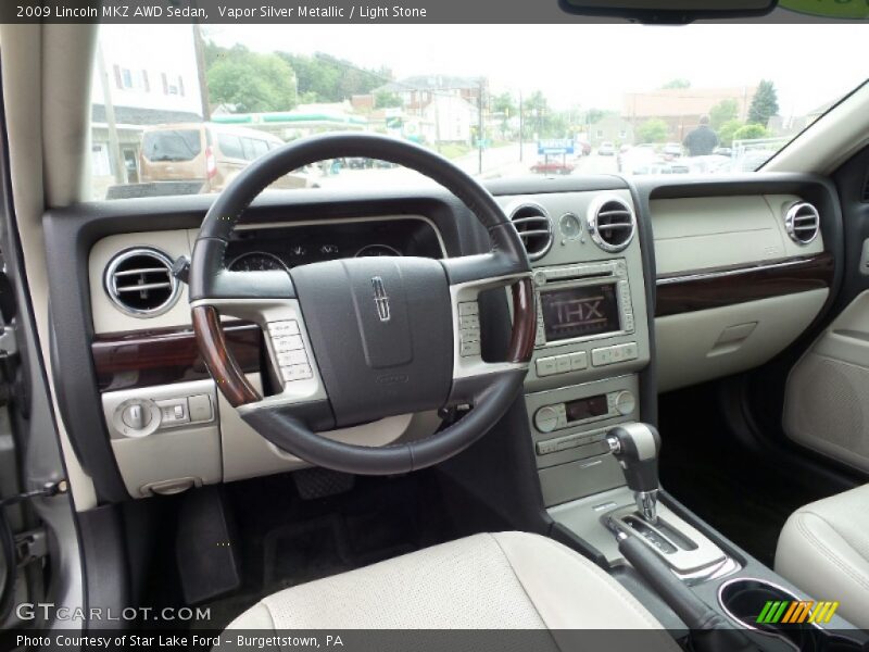 Vapor Silver Metallic / Light Stone 2009 Lincoln MKZ AWD Sedan