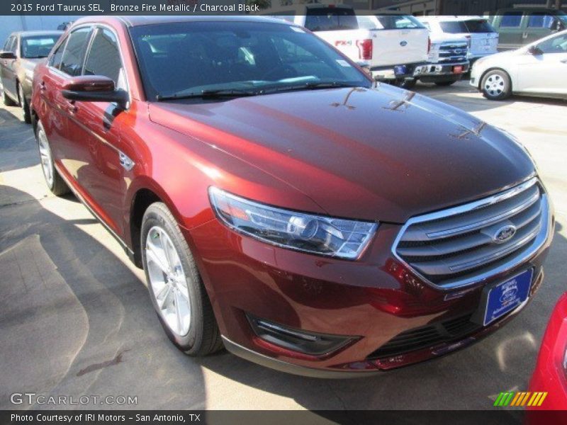 Bronze Fire Metallic / Charcoal Black 2015 Ford Taurus SEL