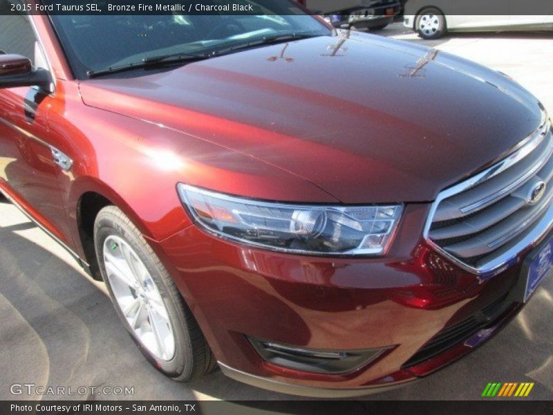 Bronze Fire Metallic / Charcoal Black 2015 Ford Taurus SEL