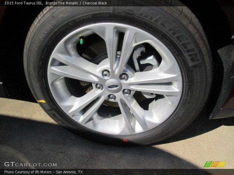 Bronze Fire Metallic / Charcoal Black 2015 Ford Taurus SEL