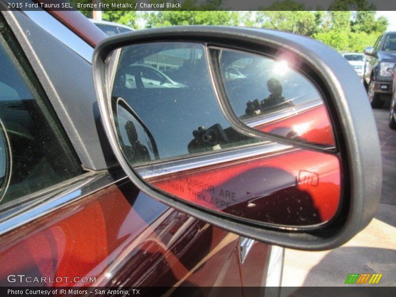 Bronze Fire Metallic / Charcoal Black 2015 Ford Taurus SEL
