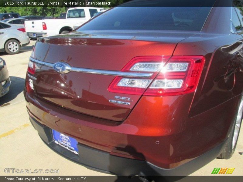 Bronze Fire Metallic / Charcoal Black 2015 Ford Taurus SEL