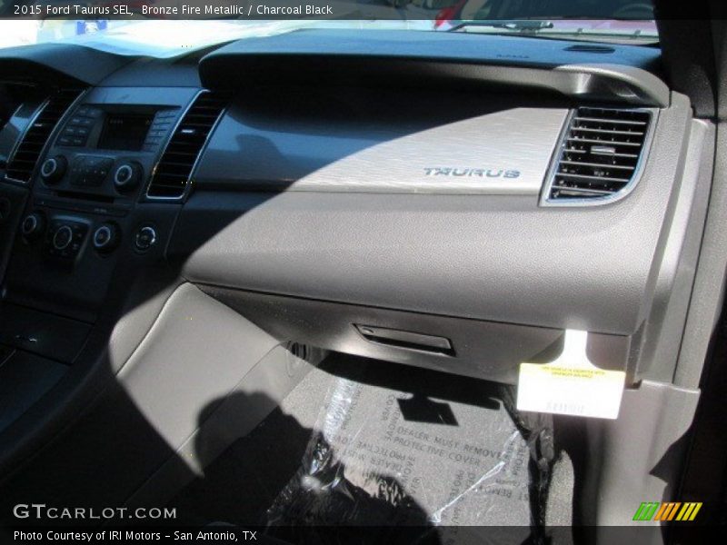 Bronze Fire Metallic / Charcoal Black 2015 Ford Taurus SEL