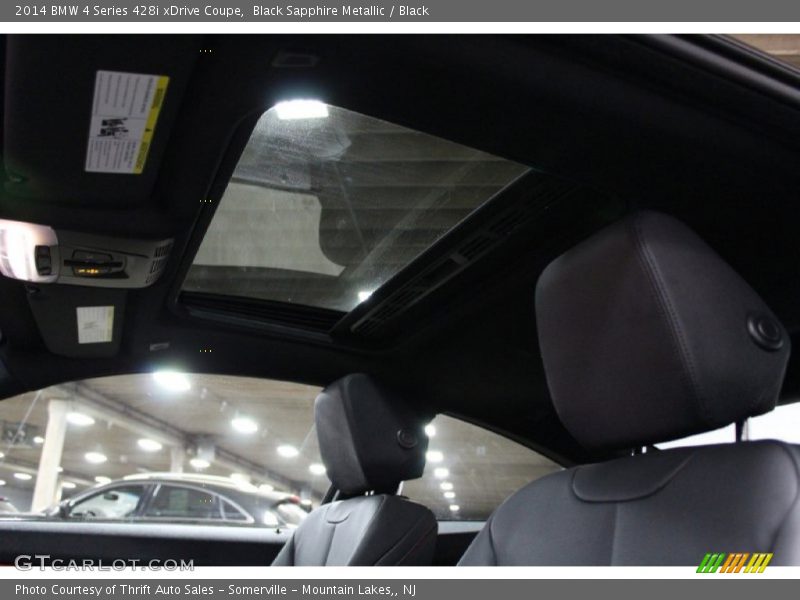 Black Sapphire Metallic / Black 2014 BMW 4 Series 428i xDrive Coupe