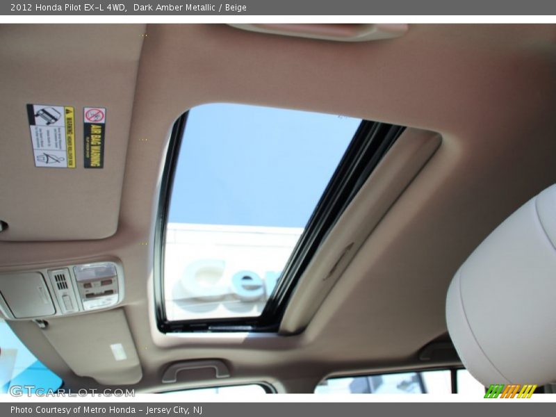 Dark Amber Metallic / Beige 2012 Honda Pilot EX-L 4WD