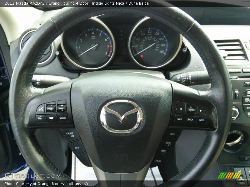 Indigo Lights Mica / Dune Beige 2012 Mazda MAZDA3 i Grand Touring 4 Door
