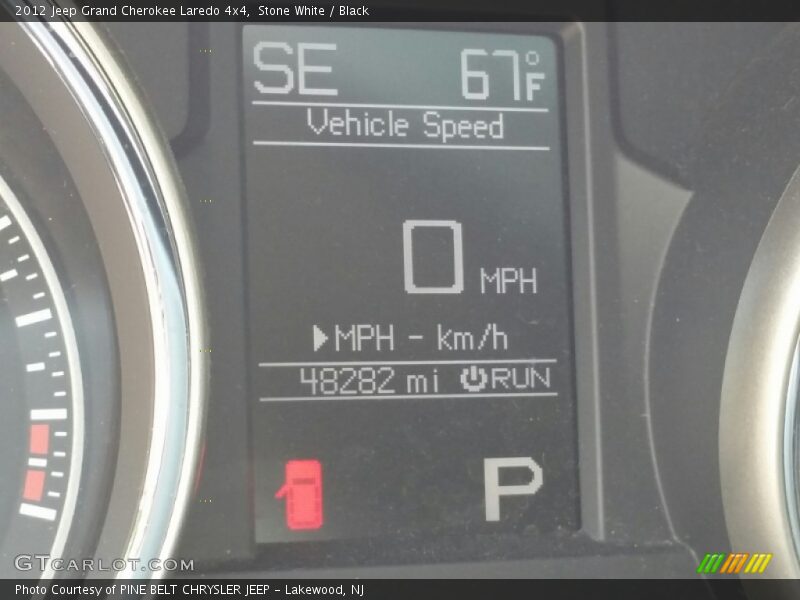 Stone White / Black 2012 Jeep Grand Cherokee Laredo 4x4