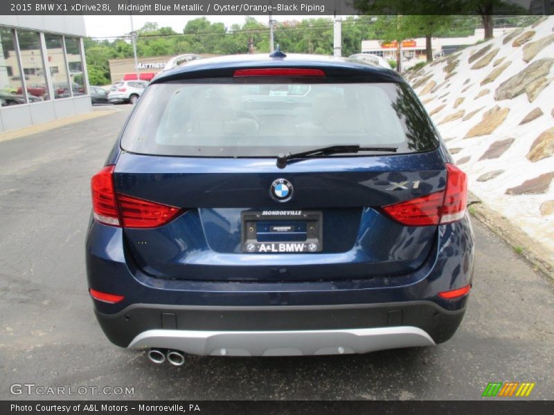 Midnight Blue Metallic / Oyster/Orange-Black Piping 2015 BMW X1 xDrive28i