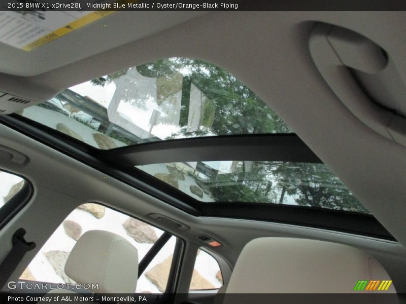Midnight Blue Metallic / Oyster/Orange-Black Piping 2015 BMW X1 xDrive28i