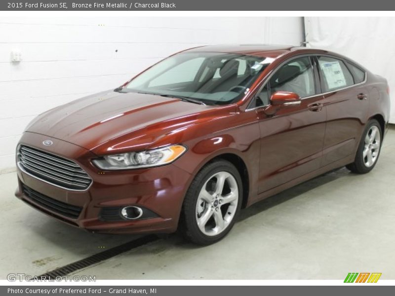 Bronze Fire Metallic / Charcoal Black 2015 Ford Fusion SE
