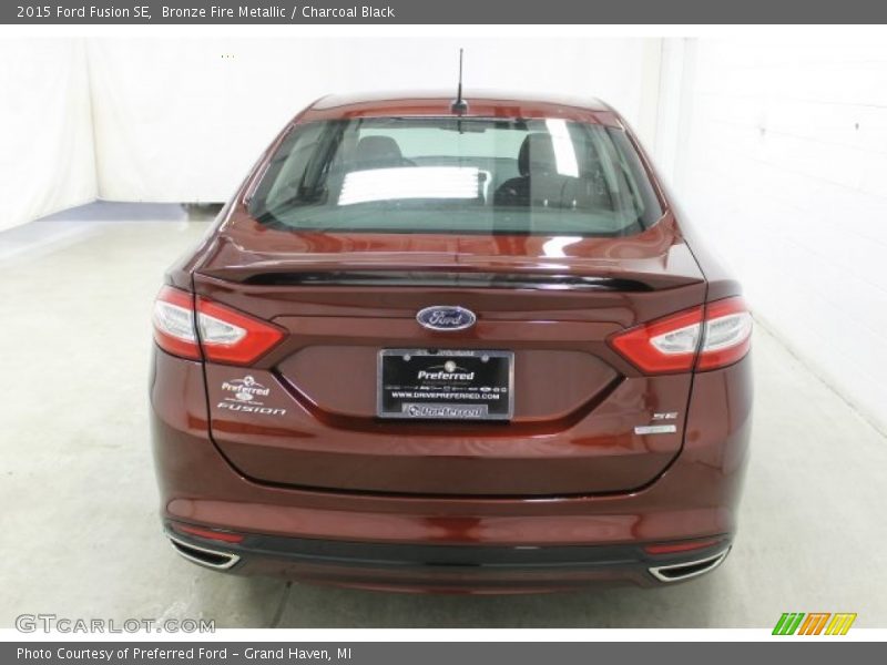 Bronze Fire Metallic / Charcoal Black 2015 Ford Fusion SE