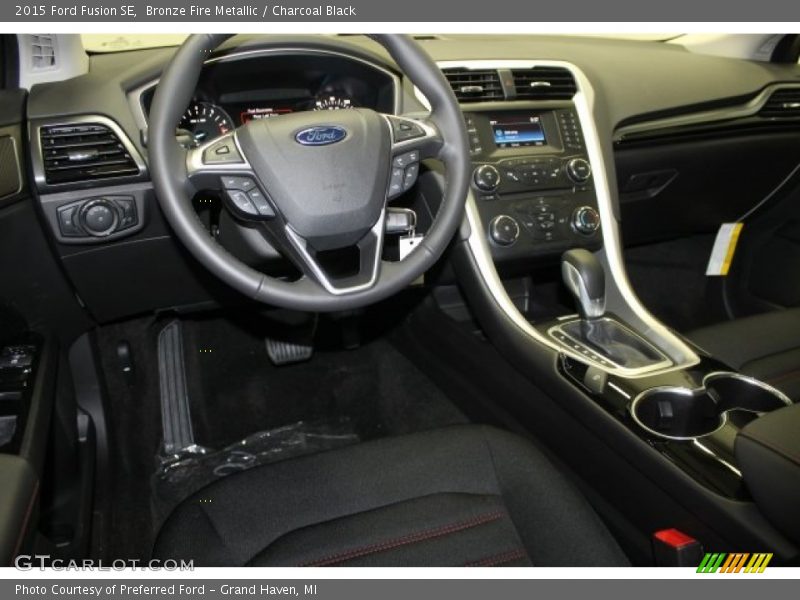 Bronze Fire Metallic / Charcoal Black 2015 Ford Fusion SE