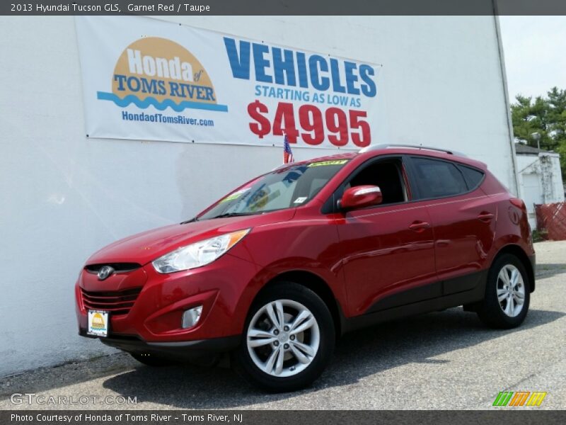 Garnet Red / Taupe 2013 Hyundai Tucson GLS