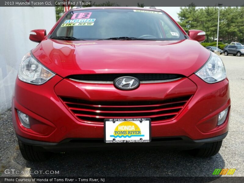 Garnet Red / Taupe 2013 Hyundai Tucson GLS