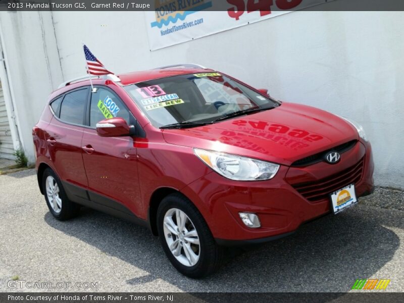 Garnet Red / Taupe 2013 Hyundai Tucson GLS