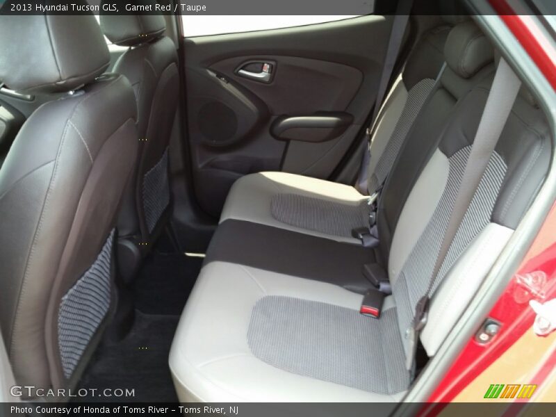 Garnet Red / Taupe 2013 Hyundai Tucson GLS