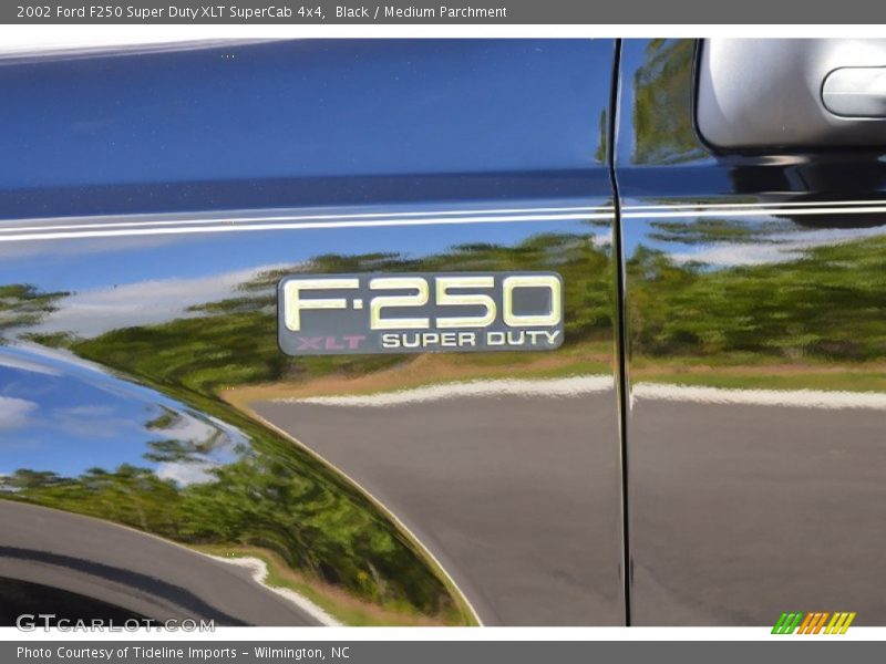 Black / Medium Parchment 2002 Ford F250 Super Duty XLT SuperCab 4x4