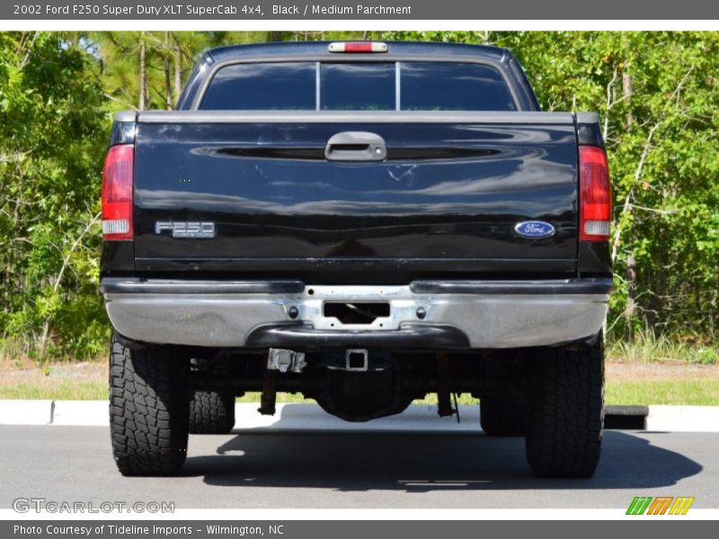 Black / Medium Parchment 2002 Ford F250 Super Duty XLT SuperCab 4x4