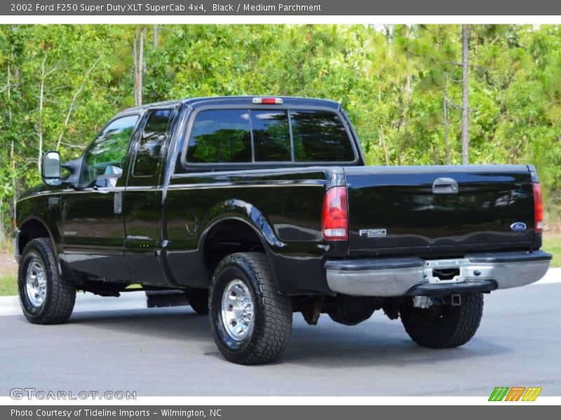 Black / Medium Parchment 2002 Ford F250 Super Duty XLT SuperCab 4x4