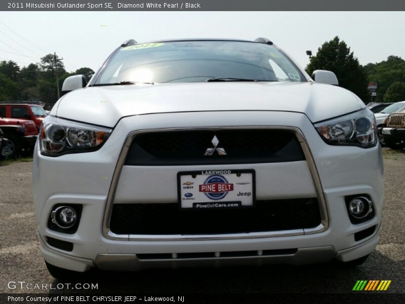 Diamond White Pearl / Black 2011 Mitsubishi Outlander Sport SE