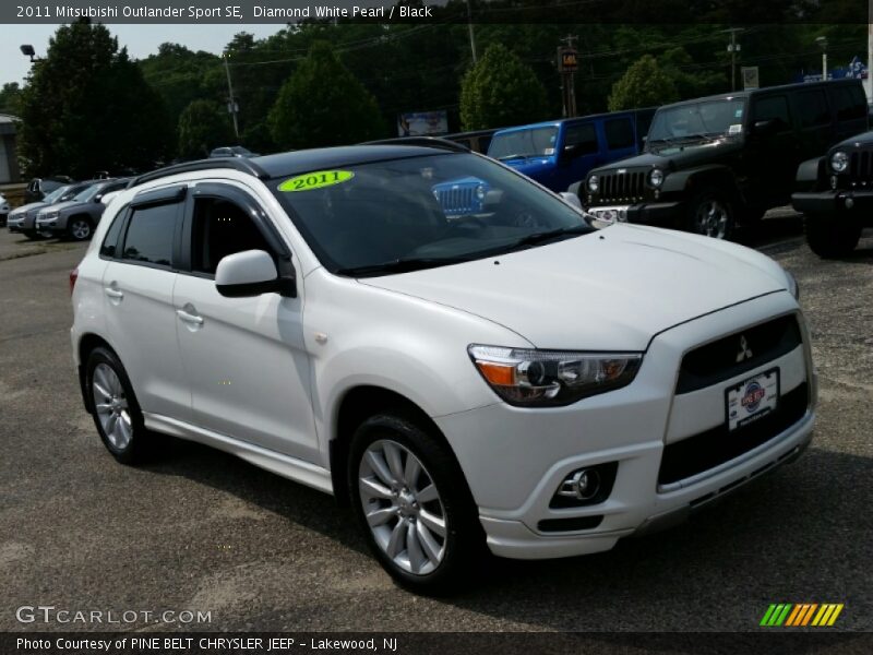 Diamond White Pearl / Black 2011 Mitsubishi Outlander Sport SE