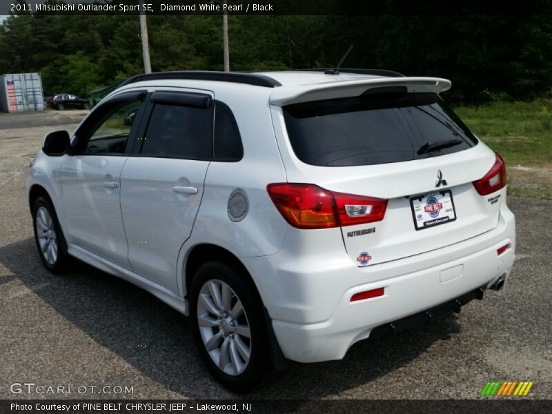 Diamond White Pearl / Black 2011 Mitsubishi Outlander Sport SE