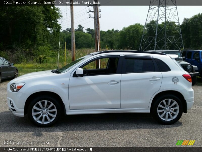 Diamond White Pearl / Black 2011 Mitsubishi Outlander Sport SE