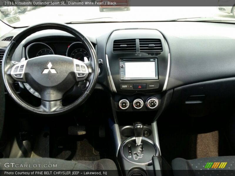Diamond White Pearl / Black 2011 Mitsubishi Outlander Sport SE