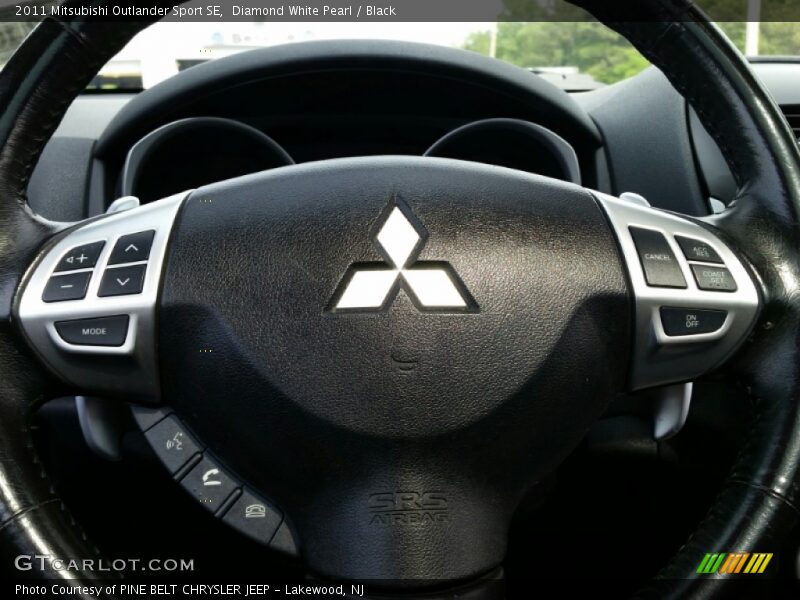Diamond White Pearl / Black 2011 Mitsubishi Outlander Sport SE
