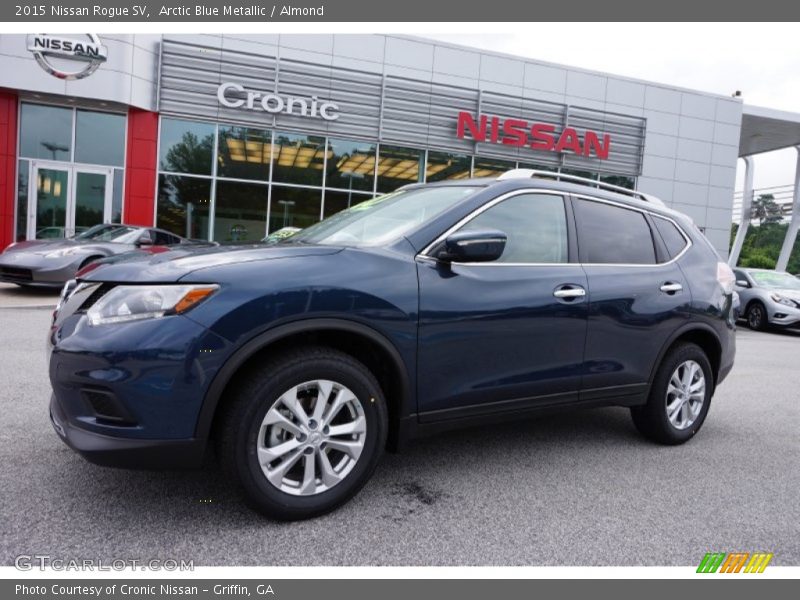 Arctic Blue Metallic / Almond 2015 Nissan Rogue SV