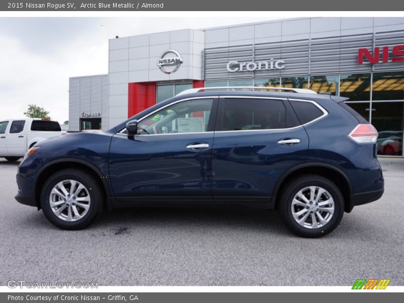 Arctic Blue Metallic / Almond 2015 Nissan Rogue SV