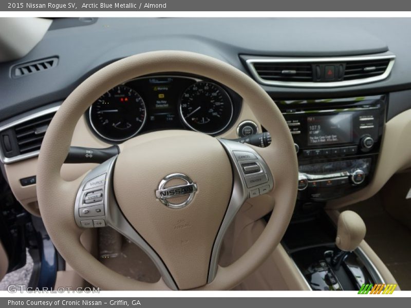 Arctic Blue Metallic / Almond 2015 Nissan Rogue SV