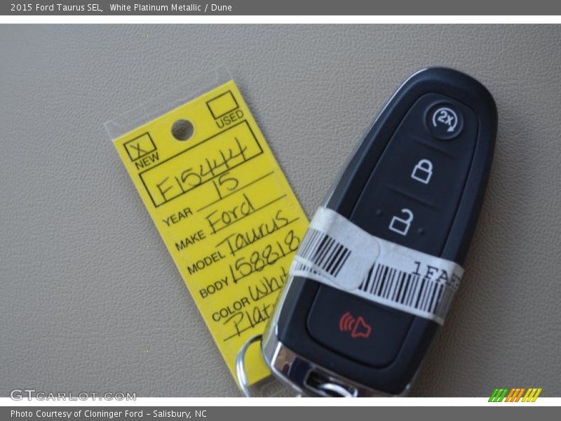 White Platinum Metallic / Dune 2015 Ford Taurus SEL