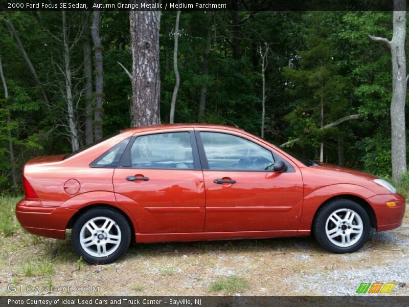 Autumn Orange Metallic / Medium Parchment 2000 Ford Focus SE Sedan