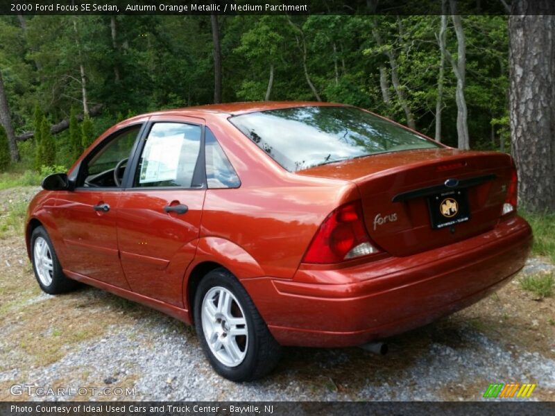 Autumn Orange Metallic / Medium Parchment 2000 Ford Focus SE Sedan