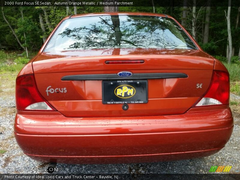 Autumn Orange Metallic / Medium Parchment 2000 Ford Focus SE Sedan