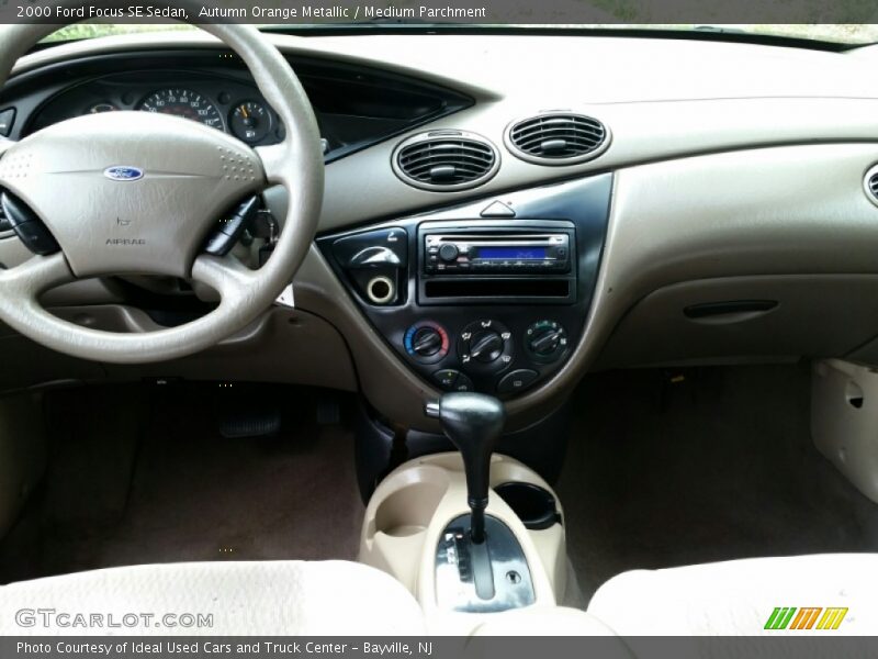 Autumn Orange Metallic / Medium Parchment 2000 Ford Focus SE Sedan