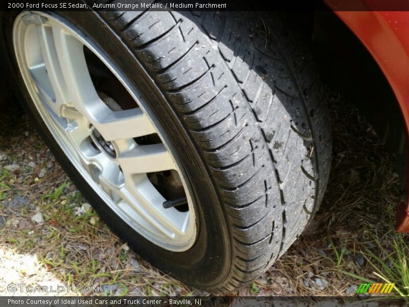 Autumn Orange Metallic / Medium Parchment 2000 Ford Focus SE Sedan