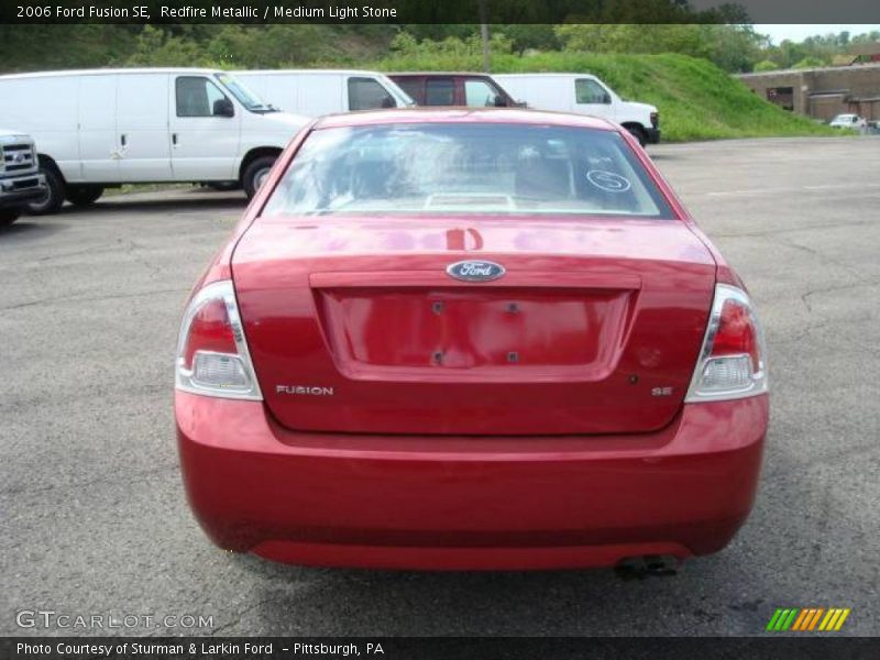 Redfire Metallic / Medium Light Stone 2006 Ford Fusion SE