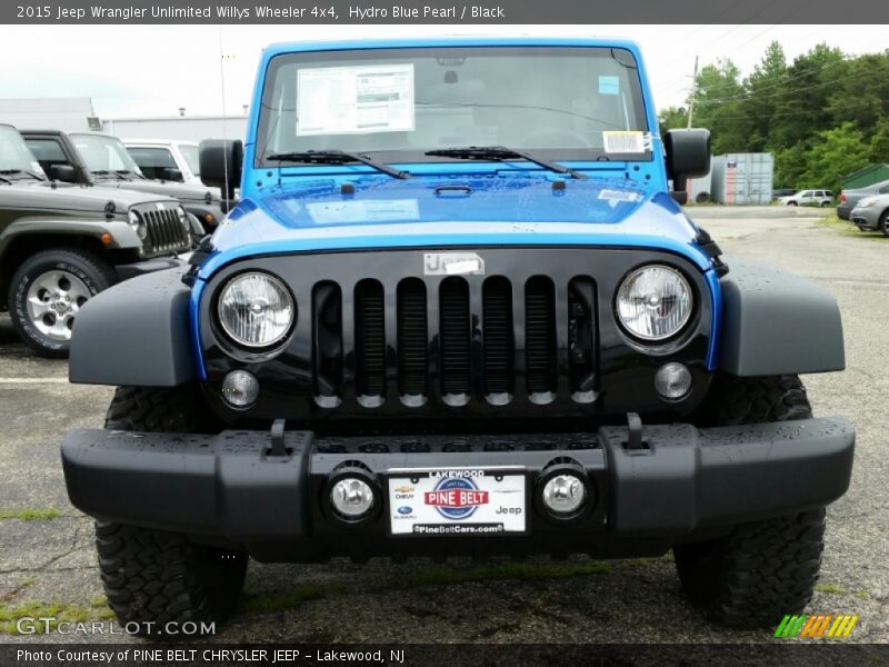 Hydro Blue Pearl / Black 2015 Jeep Wrangler Unlimited Willys Wheeler 4x4