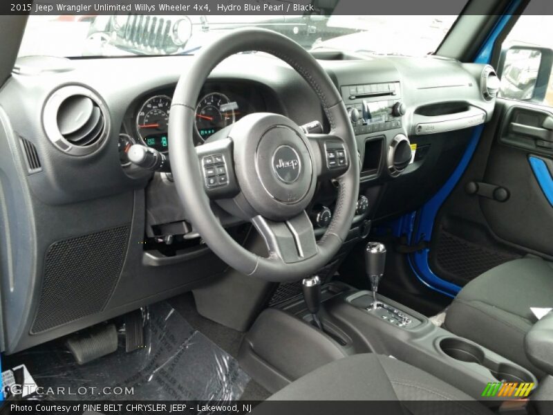 Hydro Blue Pearl / Black 2015 Jeep Wrangler Unlimited Willys Wheeler 4x4