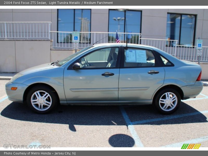 Light Tundra Metallic / Medium Parchment 2004 Ford Focus ZTS Sedan