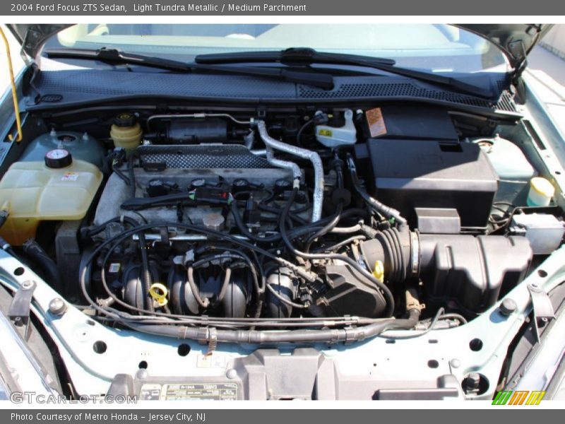 Light Tundra Metallic / Medium Parchment 2004 Ford Focus ZTS Sedan