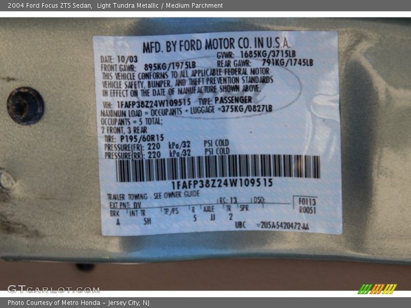 Light Tundra Metallic / Medium Parchment 2004 Ford Focus ZTS Sedan