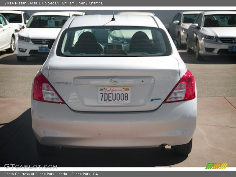 Brilliant Silver / Charcoal 2014 Nissan Versa 1.6 S Sedan