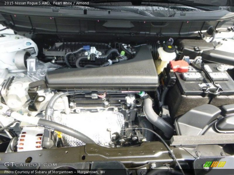Pearl White / Almond 2015 Nissan Rogue S AWD