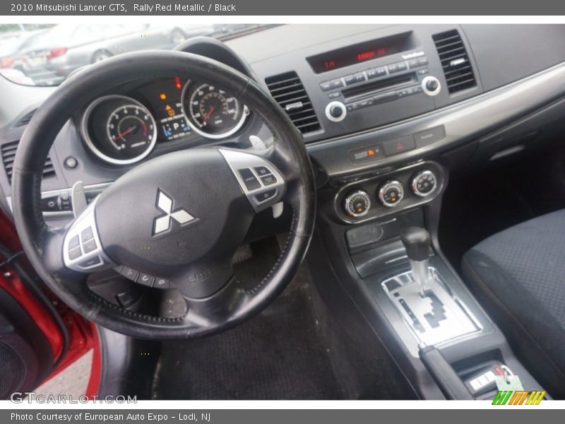 Rally Red Metallic / Black 2010 Mitsubishi Lancer GTS