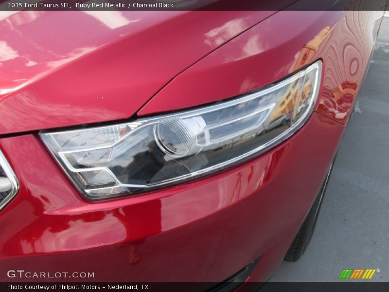 Ruby Red Metallic / Charcoal Black 2015 Ford Taurus SEL