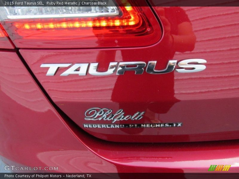 Ruby Red Metallic / Charcoal Black 2015 Ford Taurus SEL